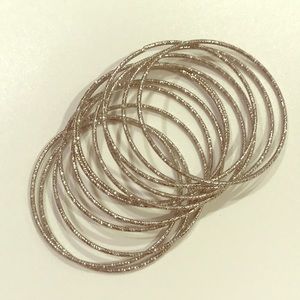 Dozen sparkly bangles